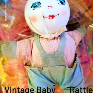 Vintage 1950's baby rattle cloth doll.